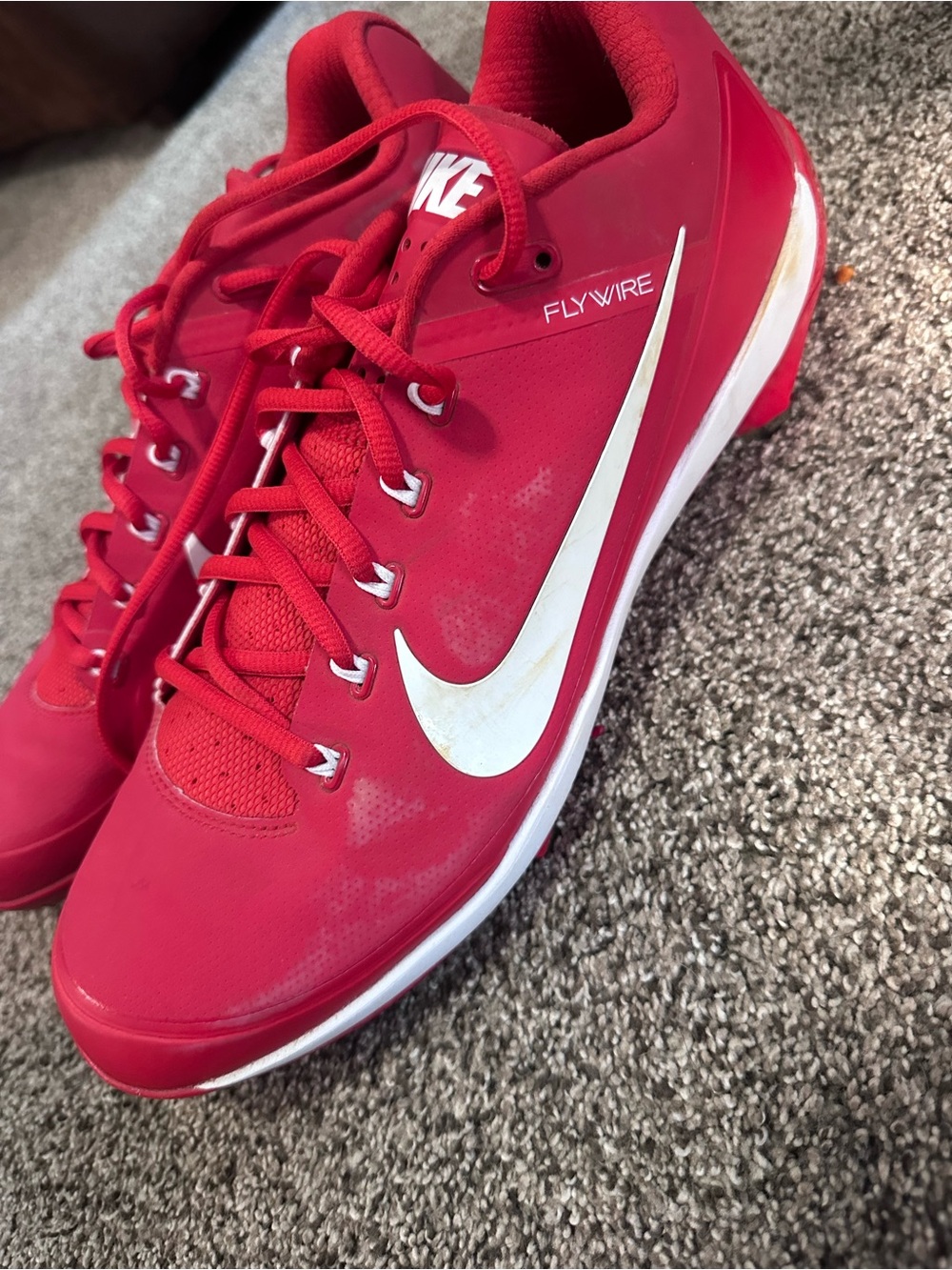 Nike Red Baseball Cleats with White Swoosh
